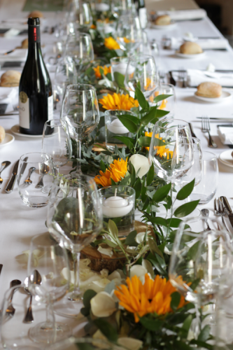 Guirlande de feuillages et tournesols pour la table d'honneur